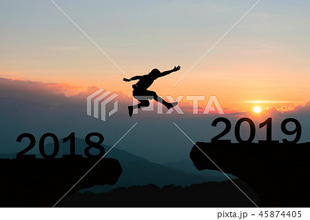 Happy New Year 2019 Men jump over silhouette Happy New Year 2019 Men jump over silhouette 45874405