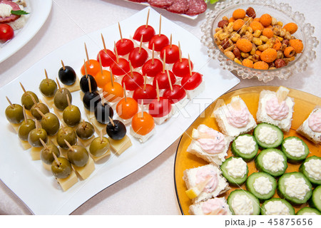 Close up of small canapes arranged on a plate Close up of small canapes arranged on a plate 45875656