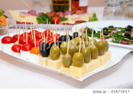 Close up of small canapes arranged on a plate Close up of small canapes arranged on a plate 45875657