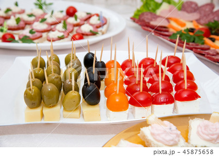 Close up of small canapes arranged on a plate Close up of small canapes arranged on a plate 45875658