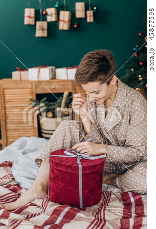 girl pajamas gift boxes decor christmas tree 45877598