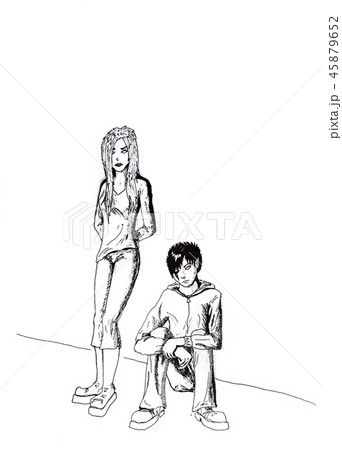 Two hipsters on the street. The guy sat down and smokes and his girlfriend is standing nearby. Black 45879652