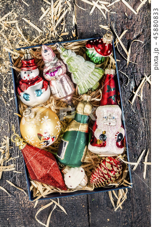 Box with vintage glass Christmas toys top view 45880833