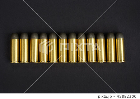 The .45 caliber revolver cartridges on black  45882300