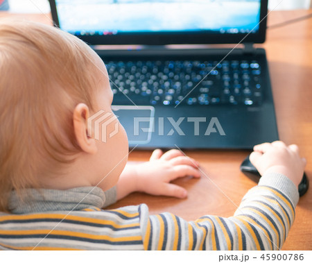 little child learning alphabet on laptop computer 45900786