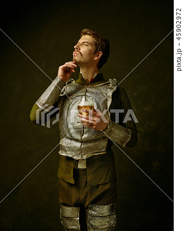 Medieval knight on dark background. 45902972
