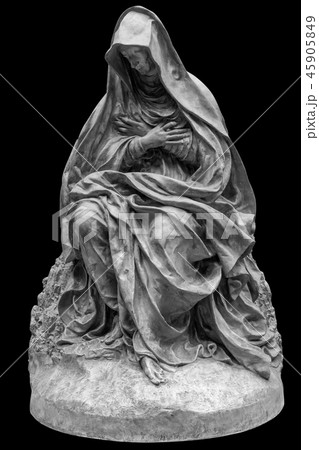 Old statue of a suffering woman isolated on black 45905849