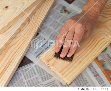 Wood treatment with sandpaper Wood treatment with sandpaper 45906773