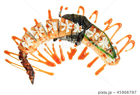 Sushi rolls in the shape of a dragon. 45906797