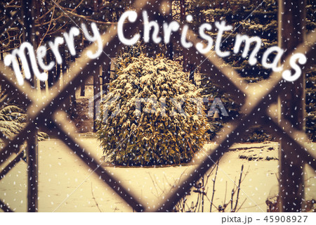 Merry Christmas card of winter view through window Merry Christmas card of winter view through window 45908927