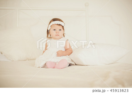 Portrait of a cute little girl Portrait of a cute little girl 45913623