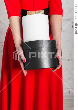 Gift woman showing beautiful gift 45913840