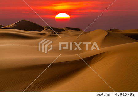 Beautiful desert landscape with a colorful sunset. Sunset sun. 45915798
