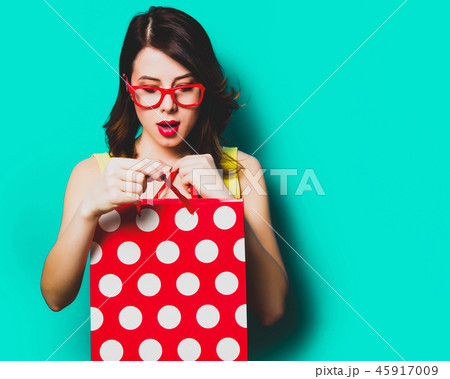 young woman with shopping bag young woman with shopping bag 45917009
