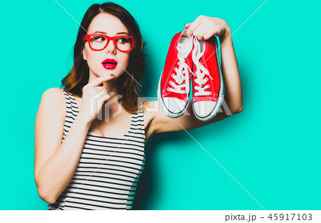 young woman with gumshoes 45917103
