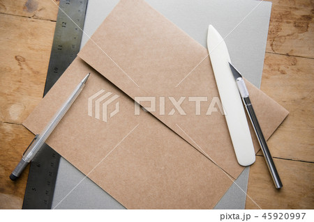 Envelope with knife and paper scorer 45920997