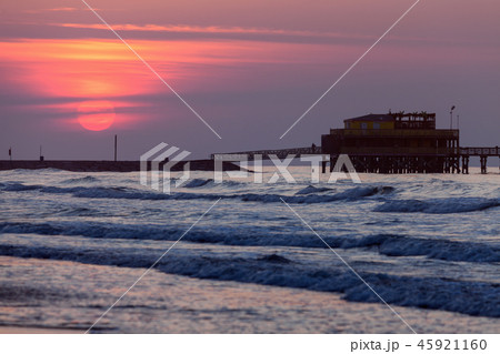 Beach and pier at sunset in Galveston, Texas Beach and pier at sunset in Galveston, Texas 45921160