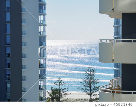 Apartment buildings by beach Apartment buildings by beach 45921346