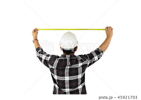Builder measuring size with tape meter isolated on white backgroun. Builder measuring size with tape meter isolated on white backgroun. 45921703
