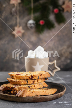 Traditional italian cookies biscotti with dried cranberry and nuts. Christmas cookies. Traditional italian cookies biscotti with dried cranberry and nuts. Christmas cookies. 45924341
