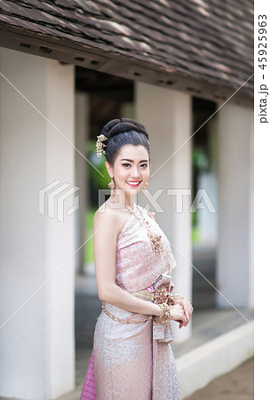 Beautiful Thai girl in Thai traditional costume. Beautiful Thai girl in Thai traditional costume. 45925963