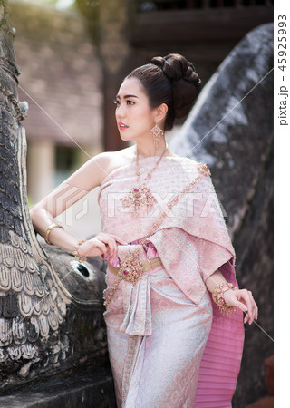 Beautiful Thai girl in Thai traditional costume Beautiful Thai girl in Thai traditional costume 45925993