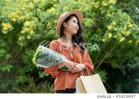 Happy woman with flowers 45928697