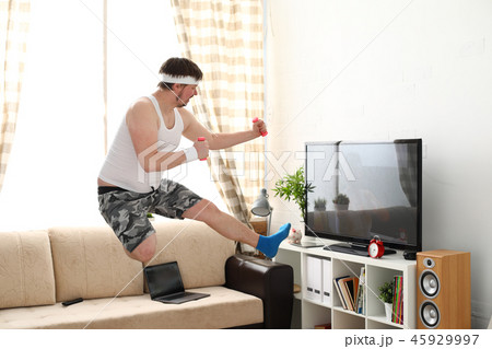 Young handsome man in shorts and 45929997