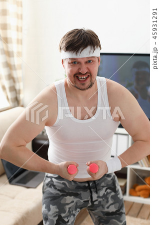 Young attractive man engaged in fitness Young attractive man engaged in fitness 45931291