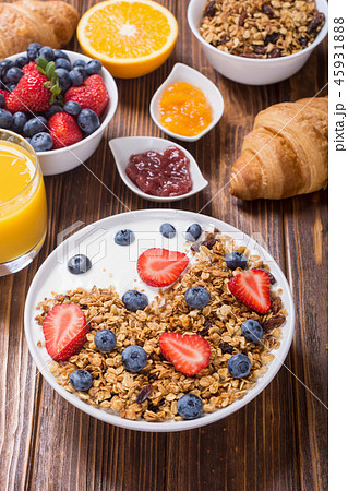Granola yogurt and berries 45931888