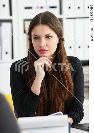 Man and smiling mature woman talking in office Man and smiling mature woman talking in office 45934964
