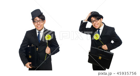 Young man in black costume with flower isolated on white 45935756
