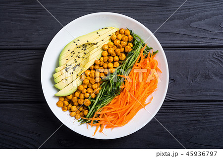 Buddha bowl with avocado cucumber carrot chickpea Buddha bowl with avocado cucumber carrot chickpea 45936797