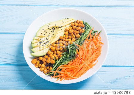 Buddha bowl with avocado cucumber carrot chickpea 45936798