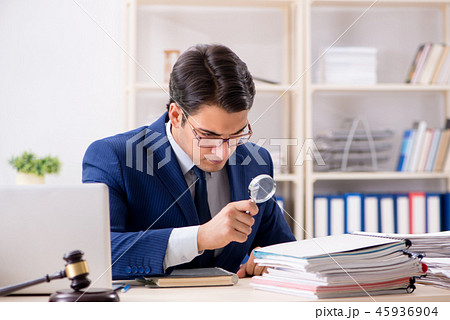 Young handsome judge working in court Young handsome judge working in court 45936904
