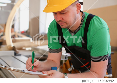Portrait of young attractive man in work 45938992