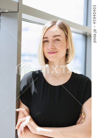 portrait of young beautiful blond woman business 45940403