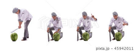 Young male cook with watermelon isolated on white 45942011