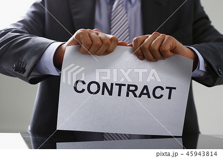 White collar worker in suit and tie tear 45943814