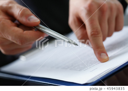 Male arm in suit offer contract form on Male arm in suit offer contract form on 45943835