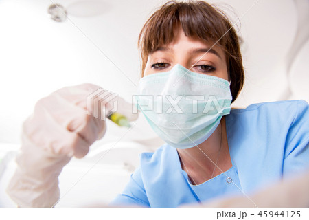 Concept of treating teeth at dentists 45944125
