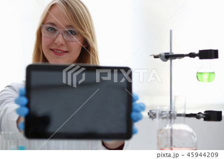 A female doctor in a chemical laboratory holds A female doctor in a chemical laboratory holds 45944209