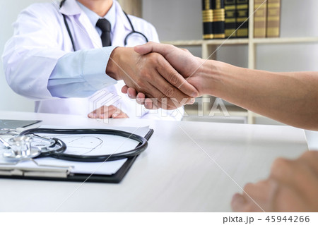 Professor Doctor having shaking hands with patient after recomme 45944266