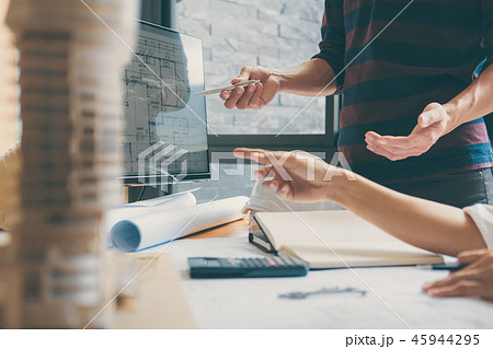 Team of Construction engineering or architect hands working on b 45944295