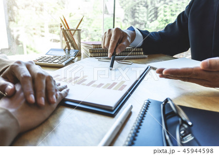 Professional Business partner discussing ideas plan and presenta Professional Business partner discussing ideas plan and presenta 45944598