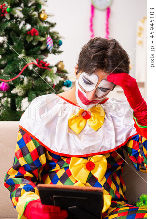 Funny clown in Christmas celebration concept Funny clown in Christmas celebration concept 45945103