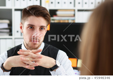 Handsome man in suit offer contract form 45946346