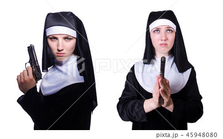 Nun with handgun isolated on white Nun with handgun isolated on white 45948080