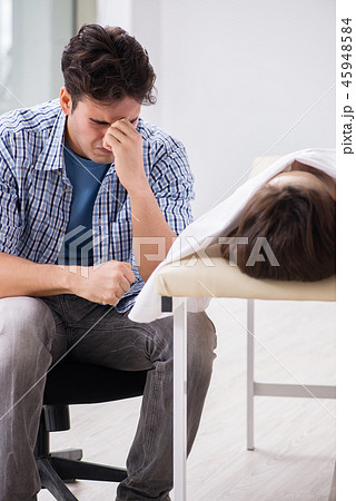 Man mourning his dead wife 45948584