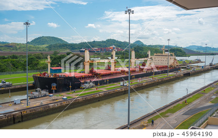 Cargo ship in lift locks of the Panama Canal. Cargo ship in lift locks of the Panama Canal. 45964190